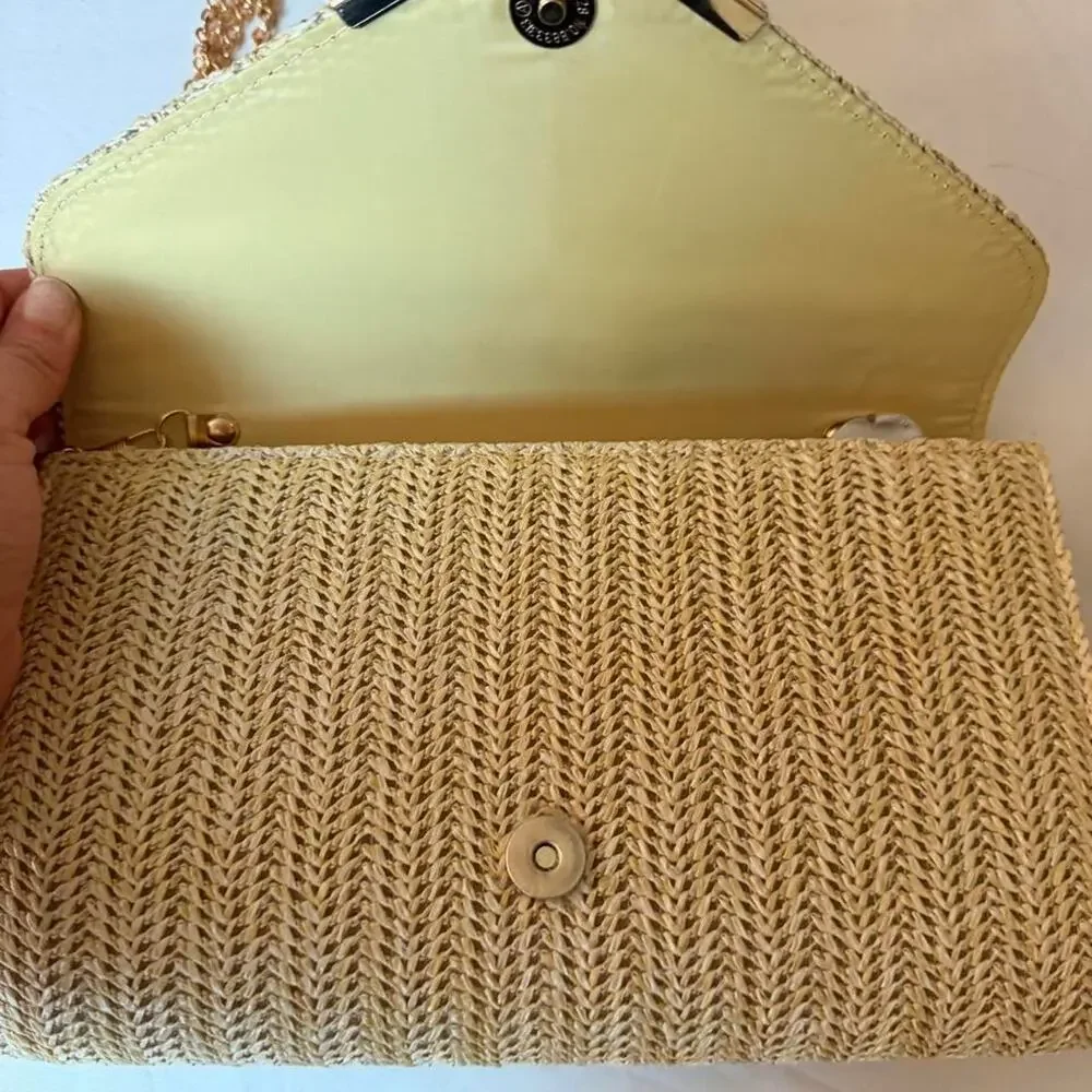 Woven clutch with gold color